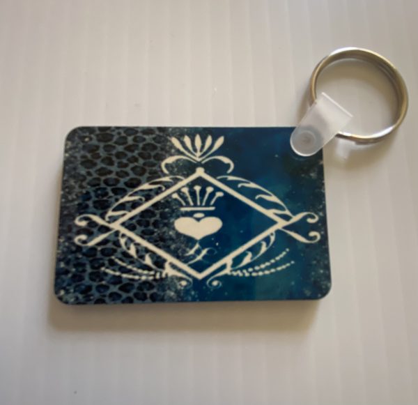 Teal and cheetah Print Key Chain